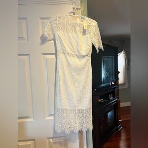 Brand new Francesca white lace mid dress. Size Small